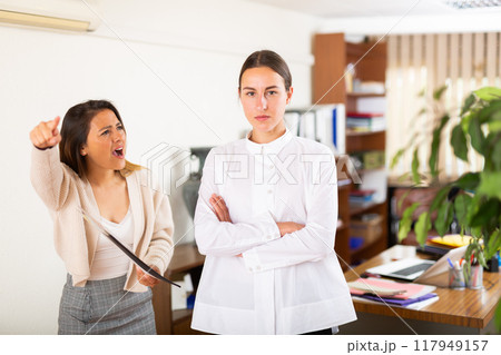 Irritated woman boss scolding manager for incompetence Irritated woman boss scolding manager for incompetence 117949157