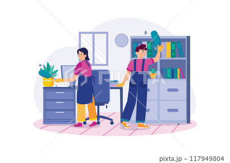 Worker cleaning the office with a feather brush 117949804