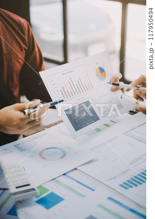 Group of Young Asian business team creative businesspeople coworker in office Happy to be successful partnership teamwork celebrating achievement and success concept. Group of Young Asian business team creative businesspeople coworker in office Happy to be successful partnership teamwork celebrating achievement and success concept. 117950494