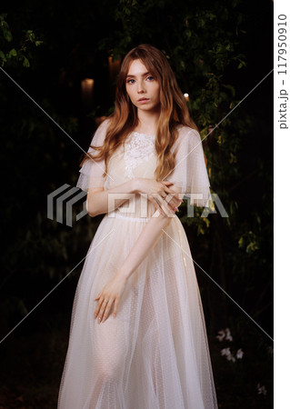Young Woman Caucasian Woman Model in Long White Dress 117950910
