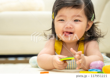 portrait of a baby girl 117951221