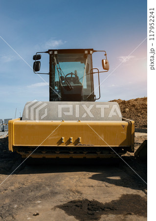 machine working on road construction machine working on road construction 117952241