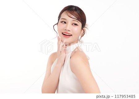 Beautiful young asian woman with clean fresh skin on white background, Face care, Facial treatment, Cosmetology, beauty and spa, Asian women portrait. Beautiful young asian woman with clean fresh skin on white background, Face care, Facial treatment, Cosmetology, beauty and spa, Asian women portrait. 117953485