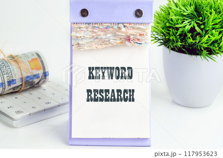 KEYWORD RESEARCH written a conceptual phrase on a desktop tear-off calendar KEYWORD RESEARCH written a conceptual phrase on a desktop tear-off calendar 117953623