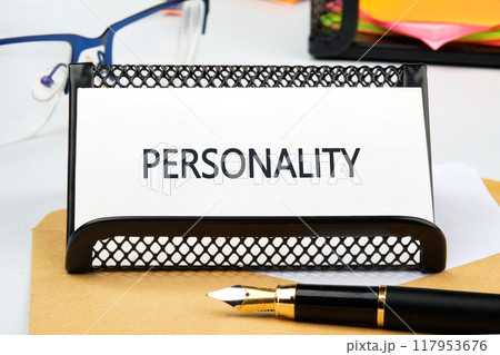Concept word PERSONALITY in a business card on a stand Concept word PERSONALITY in a business card on a stand 117953676