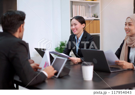 Group of diversity business people - senior executive staffs having an annual report and discussing about the business trend. Collaboration of businesspeople. Group of employees or team in meeting. 117954043