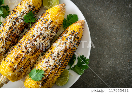 barbecue and grilled corn with cheese and lime barbecue and grilled corn with cheese and lime 117955431