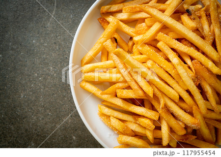 French fries with sour cream and ketchup 117955454