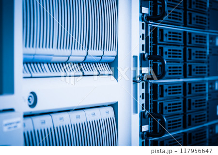 Row of hard disks used for data storage in internet data center Row of hard disks used for data storage in internet data center 117956647
