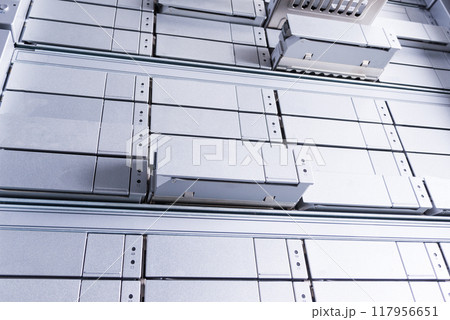 detail of data storage hardware that is undergoing maintenance, view from down 117956651