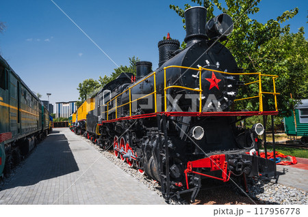 Vintage retro steam locomotive outdoors in the museum. Vintage retro steam locomotive outdoors in the museum. 117956778