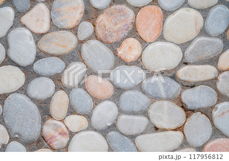The background is made of a stone wall texture. The background is made of a stone wall texture. 117956812