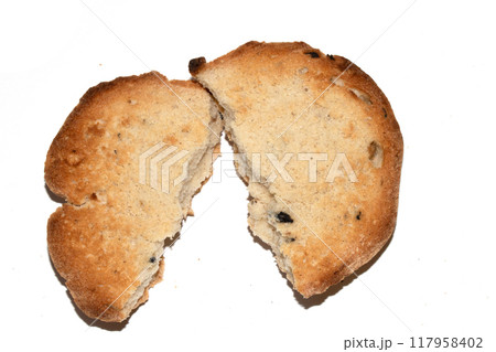 Very Burnt Bread Roll Torn or Cut in Half Toast Close Up Texture 117958402