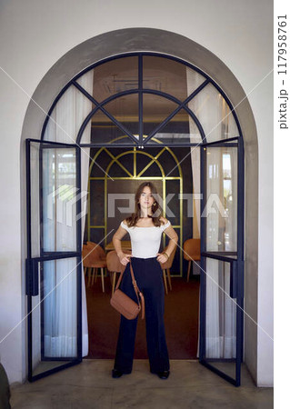 16-year-old teenage girl in old money style clothes in a fancy restaurant 16-year-old teenage girl in old money style clothes in a fancy restaurant 117958761