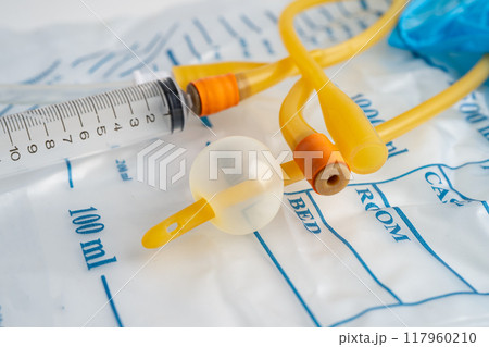 Foley urinary catheter with urine bag for disability or patient in hospital. 117960210