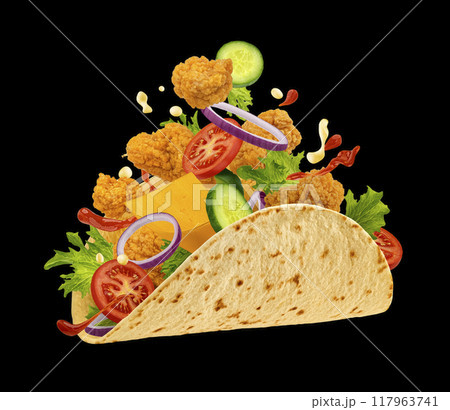 Chicken lavash roll with chicken nuggets, falling tortilla wrap ingredients isolated on black background, full depth of field 117963741