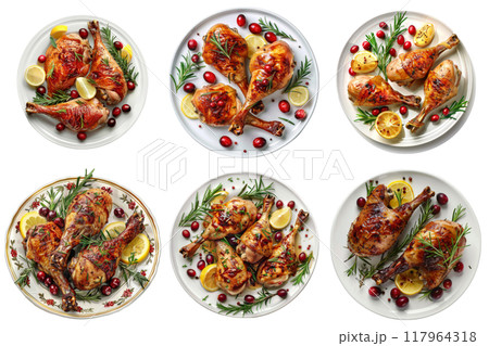 Roasted Chicken Legs with Rosemary, Lemon, and Cranberries on White Plates 117964318