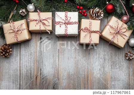 Christmas decoration and gift boxes on wooden background 117967861