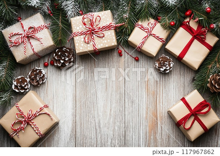 Christmas decoration and gift boxes on wooden background 117967862