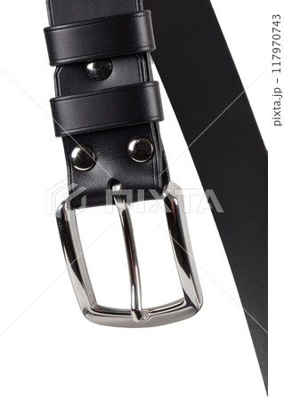 Part of a leather belt with a metal buckle close-up isolated on a white background. Part of a leather belt with a metal buckle close-up isolated on a white background. 117970743