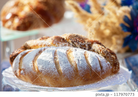 Beautiful bread and loaf in flour. Good grain harvest. 117970773