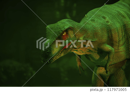 Green prehistoric dinosaur mannequin in mystical light. Green prehistoric dinosaur mannequin in mystical light. 117971005