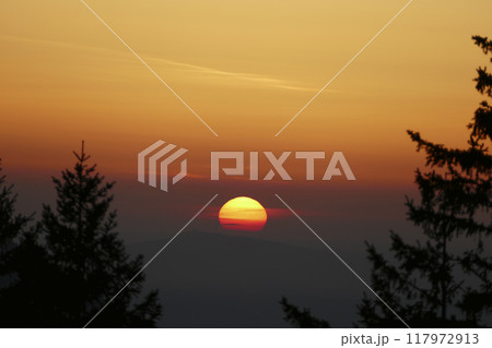 Sunset at Rechelberg mountain in wintertime, Bavaria, Germany Sunset at Rechelberg mountain in wintertime, Bavaria, Germany 117972913