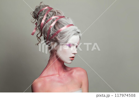 Female head and profile with makeup and creative hairstyle, beautiful face close-up 117974508