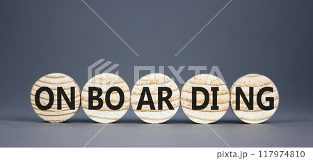 Onboarding success symbol. Concept word Onboarding on wooden circles. Beautiful grey background. Business onboarding success concept. Copy space. 117974810