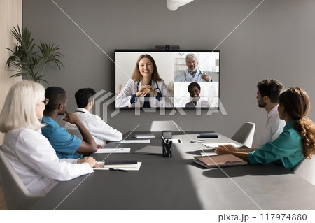 Diverse internists take part in videoconference event with colleagues Diverse internists take part in videoconference event with colleagues 117974880