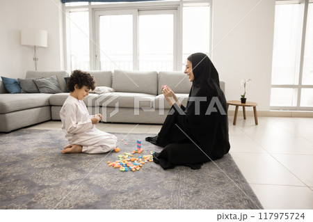 Happy Arab mother and cute son kid playing constructor together 117975724