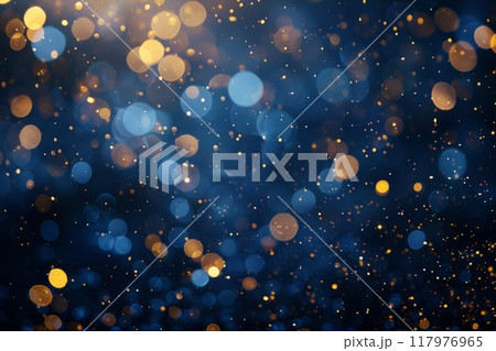 Golden particles illuminate a navy background, evoking the festive magic of the holiday season creating a warm and inviting atmosphere that perfectly captures the essence of Christmas celebrations 117976965