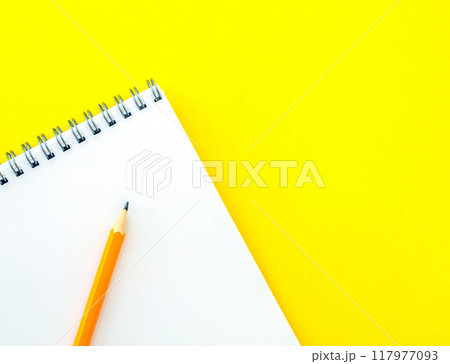 White notebook and pencil. 117977093