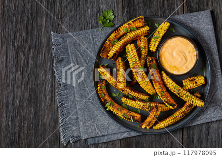 bbq corn ribs on a plate, top view 117978095