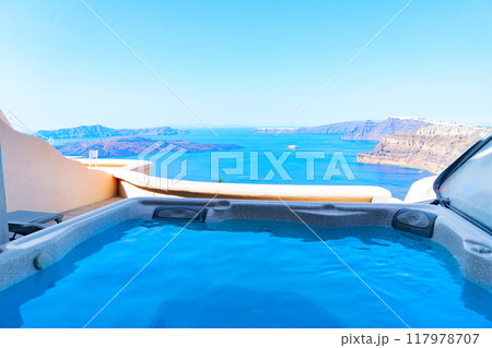Pool and view of Santorini caldera 117978707