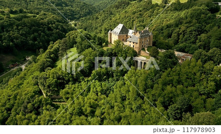 Aerial shot of Chateau d'Uriage, a historic castle in Saint-Martin-d'Uriage, an official monument in France. 117978903