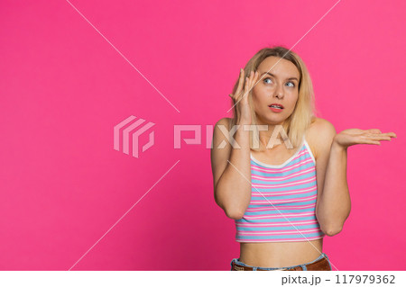 Confused woman feeling embarrassed about question, having doubts, no answer, clueless, uncertain Confused woman feeling embarrassed about question, having doubts, no answer, clueless, uncertain 117979362