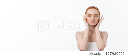 Beauty Woman. Beautiful Young Female touching Her Skin. Portrait isolated on White Background. Healthcare. Perfect Skin. Beauty Face 117980922