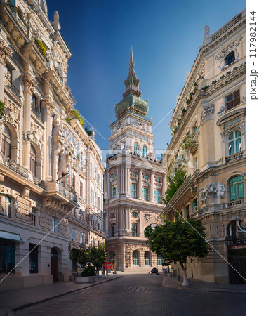 Sunrise over a historic European city street with classical architecture 117982144