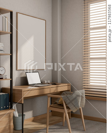 A minimalist Scandinavian home office workspace features a laptop on a wooden desk against the wall. A minimalist Scandinavian home office workspace features a laptop on a wooden desk against the wall. 117983568