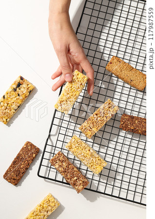 Granola Bars on a black metal stand 117987559