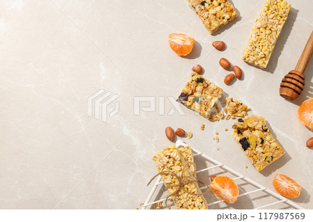 Granola Bars with nuts and fresh tangerine Granola Bars with nuts and fresh tangerine 117987569