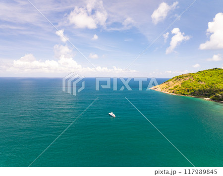 Drone view Beautiful clouds blue sky over sea in high season at Phuket Thailand Drone view Beautiful clouds blue sky over sea in high season at Phuket Thailand 117989845