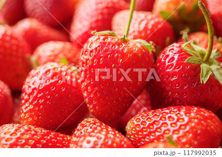 Fresh organic red strawberry fruit background Fresh organic red strawberry fruit background 117992035