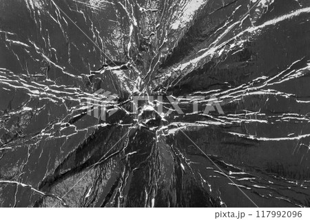 Empty old vintage black scratch torn poster overlay texture background 117992096