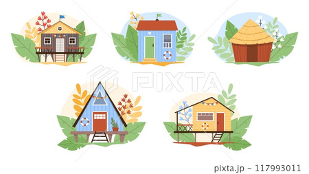 Beach hut vector set. Wooden bungalows and tropical cottages with palm leaves and flowers against white background. Beach hut vector set. Wooden bungalows and tropical cottages with palm leaves and flowers against white background. 117993011
