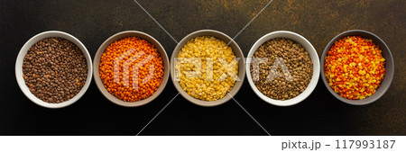 Multicolored lentils in bowls 117993187