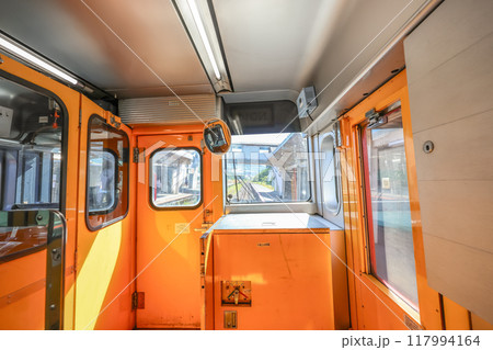 local train of Kyushu railway company on railway passing May 17 2024 117994164