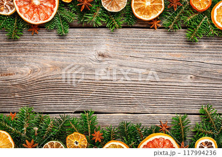 Christmas or New Year background with a border of green fir branches 117994236