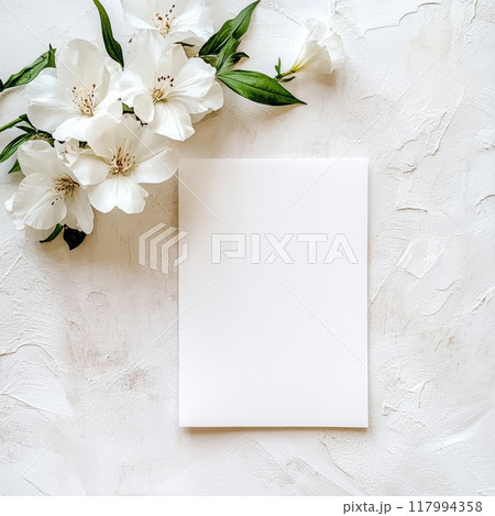 Elegant blank paper with white flowers 117994358